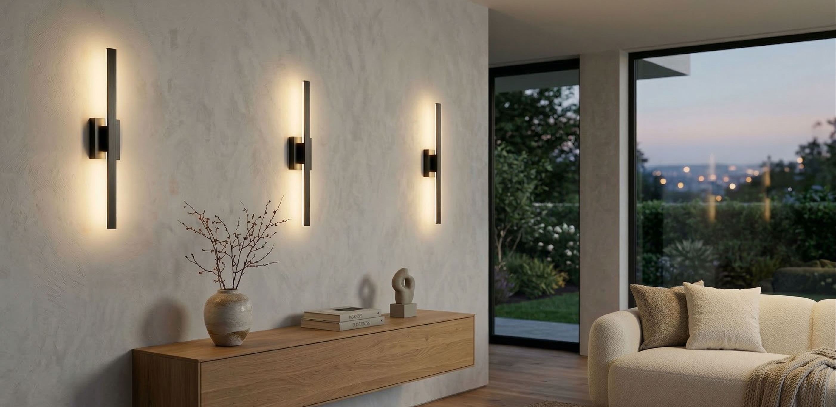 Modern living room with wall sconces, a wooden console table, and a sofa.